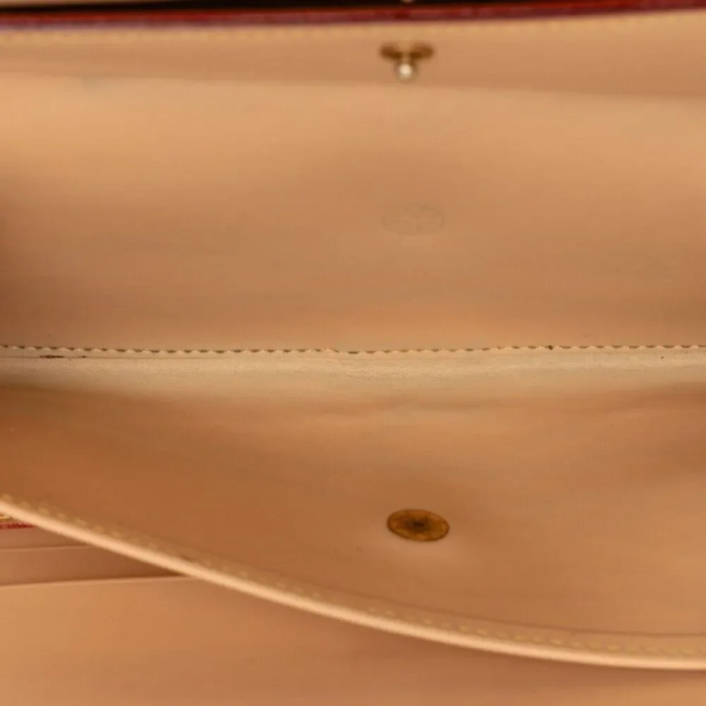 Louis Vuitton Porte Tresor International Trifold Wallet